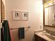 Bathroom vanity featuring countertop, sink, lighting, mirror and towel rail at 4609 S Kalispell Way, Aurora, CO 80015