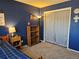 Comfortable bedroom features carpet, natural light and wardrobe closet at 4609 S Kalispell Way, Aurora, CO 80015