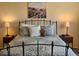 Bedroom with decorative art above the bed at 4609 S Kalispell Way, Aurora, CO 80015