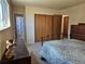 Bedroom with access to bathroom and closet at 4609 S Kalispell Way, Aurora, CO 80015