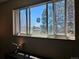 Window with view of neighborhood and stained glass decoration at 4609 S Kalispell Way, Aurora, CO 80015