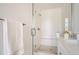 Stylish bathroom with a glass-enclosed shower, and elegant fixtures at 10880 E Hinsdale Cir, Centennial, CO 80112