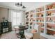 Inviting living room with custom built-in shelving and neutral decor at 19475 W 94Th Ave, Arvada, CO 80007