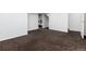 Finished basement space showcasing carpeting and visible ductwork at 3742 S Granby Way, Aurora, CO 80014