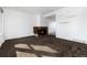 View of living room showcasing fireplace, neutral paint, and space for personalization at 3742 S Granby Way, Aurora, CO 80014