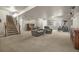 Finished basement with stairs, dual recliner, and home gym at 15616 Soo Line Way, Monument, CO 80132