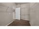 Walk-in closet with multiple shelves and carpeted flooring at 15616 Soo Line Way, Monument, CO 80132
