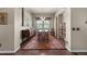 Formal dining room showcasing hardwood floors, decorative rug, chandelier, and classic furniture at 15616 Soo Line Way, Monument, CO 80132