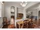 Dining room with wood table set and decorative rug at 15616 Soo Line Way, Monument, CO 80132