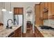 Gourmet kitchen features stainless steel appliances and granite countertops, perfect for cooking enthusiasts at 15616 Soo Line Way, Monument, CO 80132