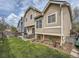 This backyard offers a well-maintained lawn and wood fence at 16181 White Hawk Dr, Parker, CO 80134