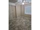 This bedroom offers a neutral color palette, overhead lighting, and vinyl floors at 16181 White Hawk Dr, Parker, CO 80134