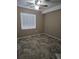 This bedroom offers a neutral color palette, overhead lighting, and vinyl floors at 16181 White Hawk Dr, Parker, CO 80134
