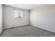 Simple bedroom featuring gray walls and carpet at 16641 Martingale Dr, Parker, CO 80134
