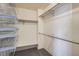Large walk-in closet with wire shelving and hanging rod at 16641 Martingale Dr, Parker, CO 80134