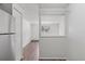 View of hallway, features an access door and updated flooring at 8826 E Florida Ave # G11, Denver, CO 80247