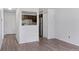 Living room offers wood floors and kitchen access with stainless steel appliances, and ample natural light at 8826 E Florida Ave # G11, Denver, CO 80247