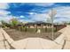 Lovely single-story home featuring a wooden fence and manicured landscaping at 710 4Th St, Bennett, CO 80102
