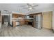 Spacious kitchen with stainless steel appliances, wood cabinets, and ample counter space at 710 4Th St, Bennett, CO 80102