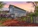 Backyard featuring a wooden deck, scattered wooden material, and views of the home at 772 Ivywood Ct, Highlands Ranch, CO 80126