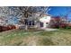 Scenic backyard featuring vibrant landscaping and a cozy patio area for enjoying the outdoors at 13684 Lilac St, Thornton, CO 80602