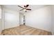 Carpeted bedroom with a ceiling fan, plenty of closet space, and room to relax at 13684 Lilac St, Thornton, CO 80602