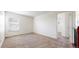 Carpeted bedroom with natural light from a window for a bright and airy feel at 13684 Lilac St, Thornton, CO 80602