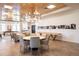 Elegant dining area with modern light fixtures and a stylish table, perfect for gatherings at 3401 Arapahoe Ave # 105, Boulder, CO 80303