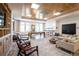 Bright lounge area featuring a billiard table, comfortable seating, and stylish decor at 3401 Arapahoe Ave # 105, Boulder, CO 80303