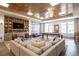 Relaxing lounge area with a pool table, comfortable sofa, and custom built-in shelving at 3401 Arapahoe Ave # 105, Boulder, CO 80303