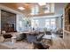 Comfortable lounge area with a fireplace, sofa, and variety of seating options at 3401 Arapahoe Ave # 105, Boulder, CO 80303