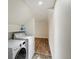 Neat laundry room with washer, dryer, and folding space at 10954 W 100Th Way, Broomfield, CO 80021