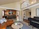 Open-concept living space with a view into the kitchen and upper level at 10954 W 100Th Way, Broomfield, CO 80021