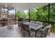 Outdoor dining area on covered deck with grill at 10954 W 100Th Way, Broomfield, CO 80021