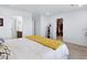 Comfortable bedroom with carpet, neutral decor and a walk in closet at 17616 Bluetrail Ave, Parker, CO 80134