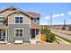 Charming exterior of a well-maintained home with modern design elements and curb appeal at 17616 Bluetrail Ave, Parker, CO 80134