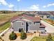Aerial view showcasing the backyard, patio, and well-maintained landscaping at 17616 Bluetrail Ave, Parker, CO 80134