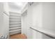 Walk-in closet with built-in shelving and ample storage space at 1201 N Williams St # 16A, Denver, CO 80218