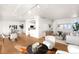 Spacious living room featuring an open layout with modern decor and parquet wood flooring at 1201 N Williams St # 16A, Denver, CO 80218