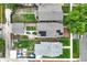 A high angle perspective of residences displaying the rooftop solar panels, landscaping, and property lines at 3611 N Vine St, Denver, CO 80205