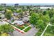 An aerial view of a neighborhood showcasing tree-lined streets and well-maintained homes, ideal for Gathering living at 3611 N Vine St, Denver, CO 80205