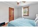 Relaxing bedroom with hardwood floors, wood trim, and a double-hung window at 3611 N Vine St, Denver, CO 80205