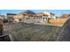Spacious backyard featuring a playground and covered patio at 2906 E 163Rd Ave, Thornton, CO 80602