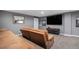 Cozy basement with large television screen for entertainment at 2906 E 163Rd Ave, Thornton, CO 80602