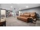 Spacious finished basement with a recreation area and additional seating at 2906 E 163Rd Ave, Thornton, CO 80602