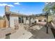 A spacious backyard patio with a metal pergola is perfect for relaxing outdoors at 11707 W 65Th Cir, Arvada, CO 80004