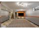 Finished basement with carpeted area and tv, perfect for recreation and relaxation at 11707 W 65Th Cir, Arvada, CO 80004