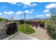 Deck, grassy yard, firepit, and mountain views at 9295 Dunraven Loop, Arvada, CO 80007