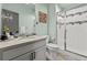 Clean bathroom with walk-in shower and modern vanity at 9295 Dunraven Loop, Arvada, CO 80007