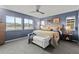 Bright bedroom with large bed and mountain views at 9295 Dunraven Loop, Arvada, CO 80007